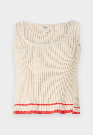 Cream-colored ribbed tank top with a scoop neck and a red horizontal stripe at the hem. Soft, textured fabric with a relaxed fit.