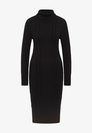 Rochie tricotată neagră cu guler înalt, având un model texturat și mâneci lungi. Accente ribbate la manșete și la tiv.