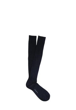 Calze al ginocchio di colore blu navy in tinta unita con texture a coste. Realizzate in un materiale morbido, presentano un logo stampato sulla parte inferiore.