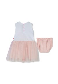 Roze tule jurk met witte katoenen top, voorzien van drie roze knopen op de achterkant. Inclusief bijpassende roze rompertje met elastische tailleband.
