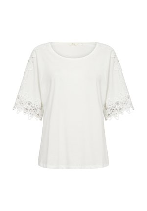 Hvid kortærmet skjorte med brede ærmer og detaljeret blonde langs kanterne. Fremstillet af blødt, letvægtsstof.