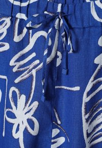 TATUUM OKLIMA - Trousers - blue