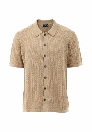 Polo in maglia color beige a maniche corte con motivo strutturato e chiusura frontale con sette bottoni.