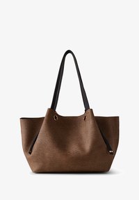 Selected, op naturale nero