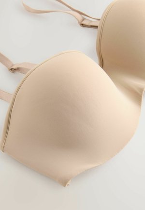 Bežová vystužená podprsenka s hladkým, elastickým materiálom. Dizajn s kosticami, nastaviteľné ramienka a bezšvový finiš s jemnou textúrou.