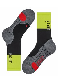 Chaussettes à motifs noirs et gris avec des accents verts. Comprend les étiquettes "GAUCHE" et "DROIT" en texte gras, un talon rouge et un design texturé.