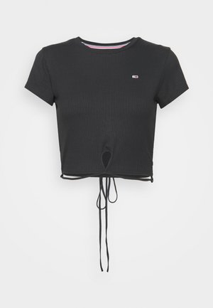 Black ribbed short-sleeve crop top with small logo on chest, round neckline, and drawstring tie at hem center.