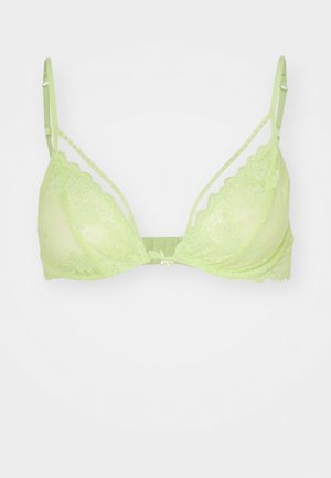 Lime green lace bra with triangular cups, adjustable straps, and floral pattern, featuring a central bow detail and soft texture.