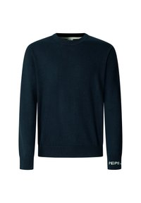 Pull bleu marine foncé à manches longues avec col rond et poignets côtelés, avec un texte blanc partiel sur le poignet de la manche droite.