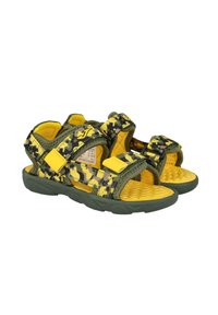 Chanclas de camuflaje verde y amarillo con correas ajustables, plantilla texturizada y una suela de goma resistente para agarre y comodidad.