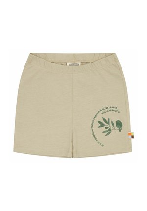 Shorts in cotone beige chiaro con vita elastica. Presentano una stampa verde di foglie d'olivo e un uccellino, oltre a un'etichetta colorata ai lati.