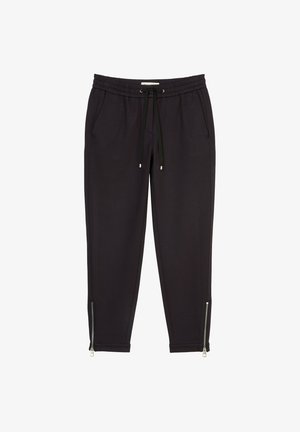 Black jogger pants with a fitted design, elastic waistband, drawstring, and zippers at the ankles for adjustability. Soft fabric texture.