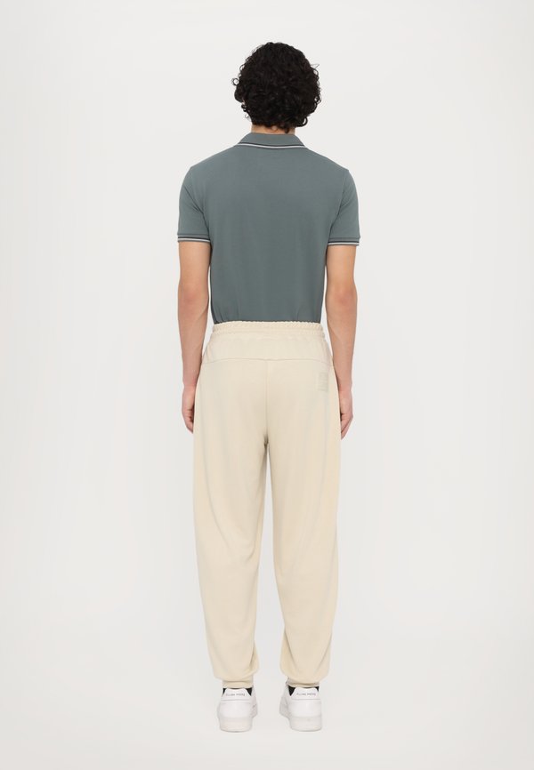 TROUSER UNISEX - Tracksuit bottoms - almond milk4