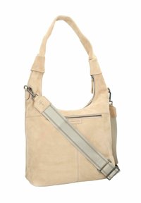 Sac à épaule en daim beige et doux avec une large bandoulière. Comprend une poche zippée et un design épuré et minimaliste avec des coutures discrètes.