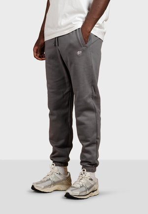 ESSENTIAL - Pantalones deportivos - anthracite