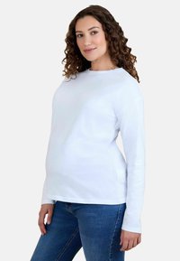 Seleccionado, white