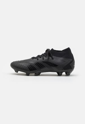 Black soccer cleat featuring a textured synthetic upper, lace closure, and molded studs for traction on the field.