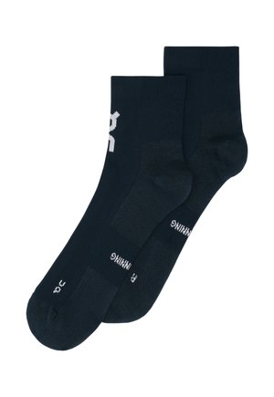 Navy blue ankle socks with a textured pattern, featuring a white logo on the side and cushioned soles for comfort.