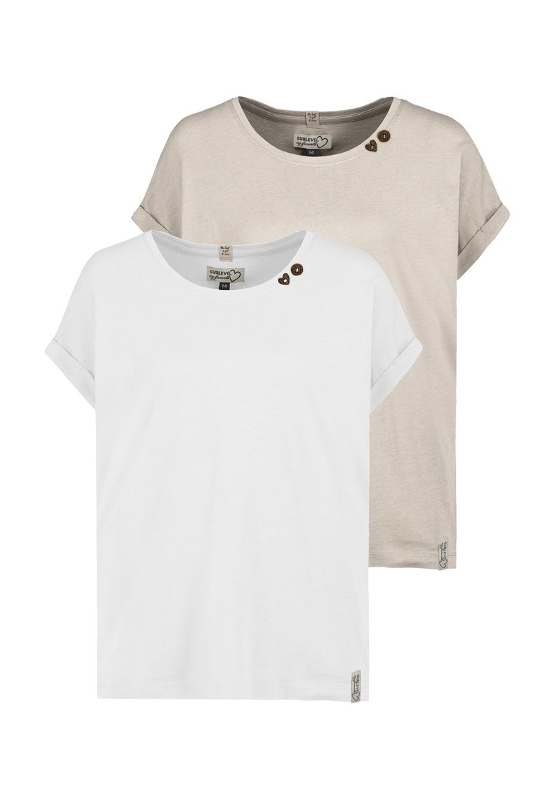 Two short-sleeve t-shirts, one white and one beige. Both feature a round neckline, rolled sleeves, and decorative buttons near the shoulder.