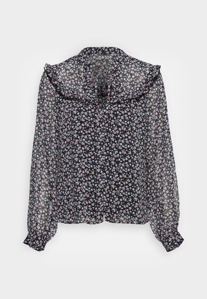 Blusa preta com padrão floral, com colarinho ruffle, mangas longas transparentes e detalhe de laço na gola. Padrão floral pequeno e multicolorido em toda a peça.