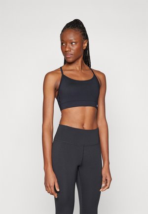 New Balance ESSENTIAL YOGA BRA - Light support sports bra - black