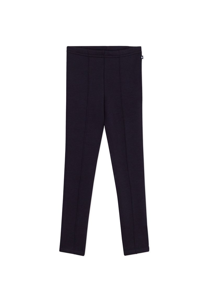 Zwarte legging gemaakt van rekbare stof. Heeft een aangesloten ontwerp, een gladde textuur en zichtbare naaiafwerking langs de benen.