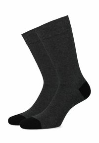 Ciemnoszare skarpetki z żebrowanym mankietem oraz czarnymi akcentami na palcach i piętach. Wykonane z miękkiego, texturedowanego materiału, zapewniającego komfort i trwałość.