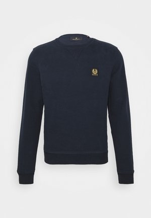 Sweatshirt azul-marinho com gola, punhos e bainha canelados. Apresenta um pequeno logo em patch dourado na área do peito esquerdo. Corte clássico.