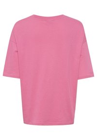 T-shirt rose uni à manches courtes, vu de dos, avec un col rond et une coupe décontractée.