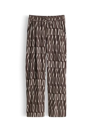 Pantalon ample avec taille élastique et lien, présentant un motif à rayures verticales ondulées marron et blanc.