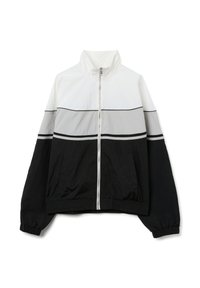 Zwart-wit-grijs windjack met kleurvlakken, hoge kraag, ritssluiting aan de voorkant, elastische manchetten en zoom, met twee zijzakken.