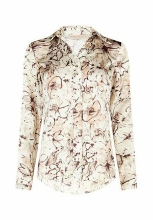Blusa a maniche lunghe in crema chiaro con motivo floreale marrone, con colletto appuntito e chiusura con bottoni, realizzata in tessuto liscio.