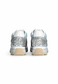 White and light blue sneakers featuring a textured glittery silver back, a cushioned sole, and a distinctive design with multi-colored accents.