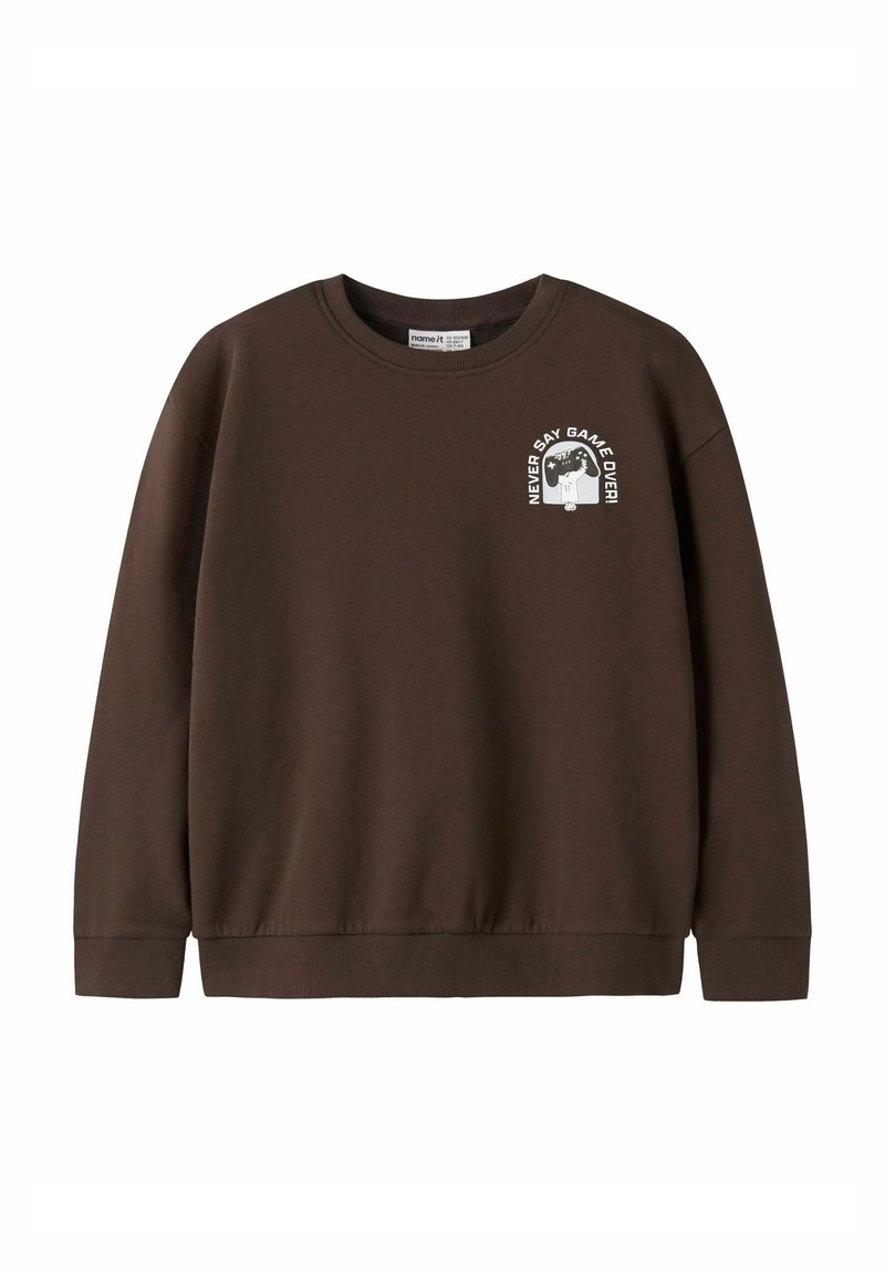 Bruine sweatshirt met ronde hals. Voorzien van een witte print met de tekst "NOOIT ZEGGEN GAME OVER!" op de linkerborst. Zachte textuur, geribbelde manchetten.