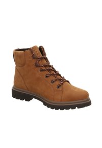 Botas de ante marrón hasta el tobillo con cordones negros y morados, suelas de goma y puntera redonda. Presentan un cuello acolchado para mayor comodidad.