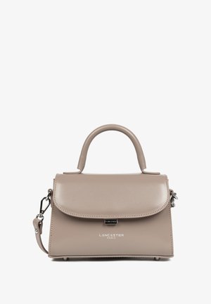 Tan handbag with a structured design, smooth texture, and a top handle. Features a detachable strap and embossed brand logo on the front.