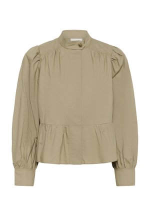 Bézs színű, hosszú ujjú blúz magas nyakkal, gombos záródással, puffadt vállakkal, megkötött derékkal és szűk mandzsettával.