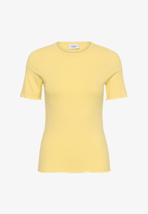 Žuta kratka pamučna majica s rebrastim uzorkom, okruglim izrezom i rubovima na rukavima i donjem dijelu poput lisnatog povrća, s natpisom "Saint" unutar ovratnika.