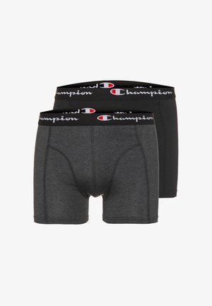 Two pairs of men's boxer briefs, one dark gray and one black, with black waistbands featuring the Champion logo in white and red.