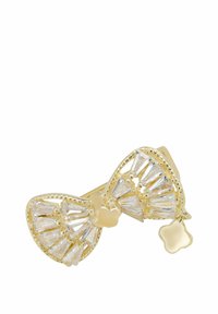Gold-tone bow-shaped ring featuring clear, geometric-cut stones. Openwork design with a floral accent detail.