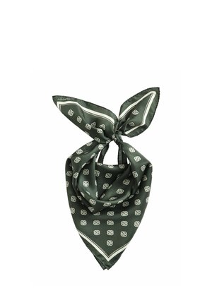 Écharpe en soie vert foncé avec motifs floraux blancs et bordure blanche, pliée et nouée avec le nom de la marque visible dans un coin.