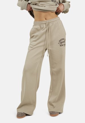 WIDE LEG PRINTED JOGGER. - Pantaloni sportivi - beige