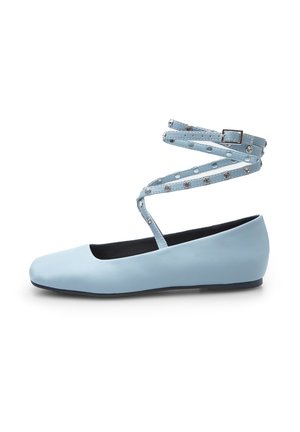 Light blue ballet flat with a rounded toe, featuring a thin ankle strap adorned with decorative silver studs. Smooth texture and low heel.
