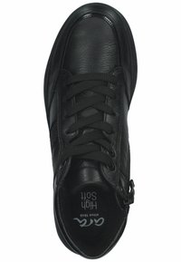 Black leather sneaker with lace-up design, textured panels, and a side zipper. Features a cushioned insole for comfort.