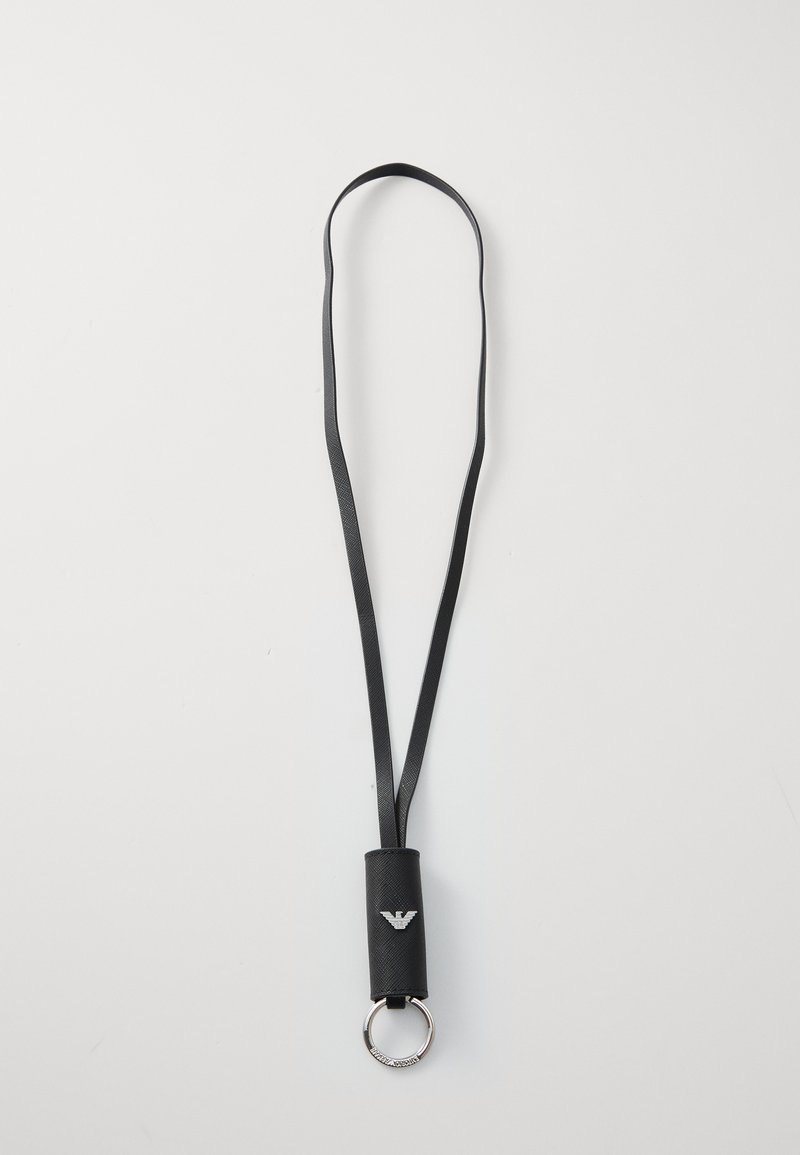 Black lanyard made of textured material with a cylindrical holder and keyring. Features a silver logo on the holder.