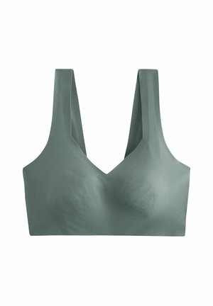 Lys grøn sømløs bralette med brede stropper og V-udskæring. Lavet af strækbart materiale, glat tekstur og uden synlige hardware.