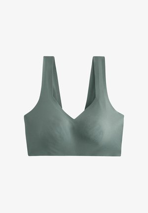 Bralette vert clair sans couture avec des larges bretelles et un décolleté en V. Fabriqué en matériau extensible, texture lisse et sans matériel visible.