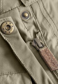 MINI A TURE WISTI SNOWSUIT UNISEX - Talvihaalari - vert