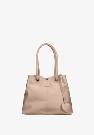 Sac à main en cuir beige avec deux longues poignées, œillets argentés, couture verticale au centre, et un porte-clés en forme de cœur suspendu sur le côté droit.