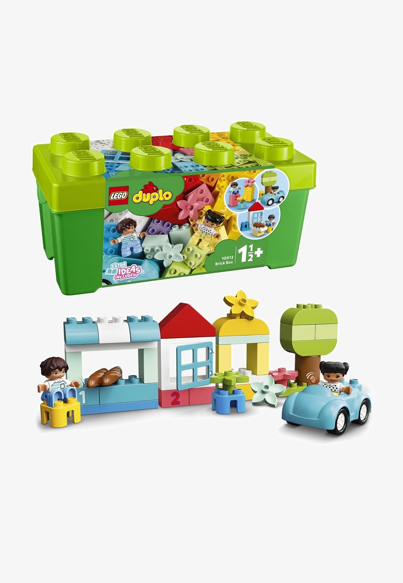 Set LEGO Duplo 10913 con una caja verde, bloques multicolores y dos figuras. Incluye casas, un árbol, flores y un coche azul.